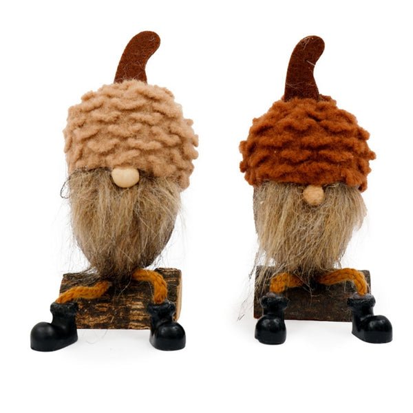 sil acorn hat gonk on log  6x17cm