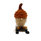 sil acorn hat gonk on log  6x17cm