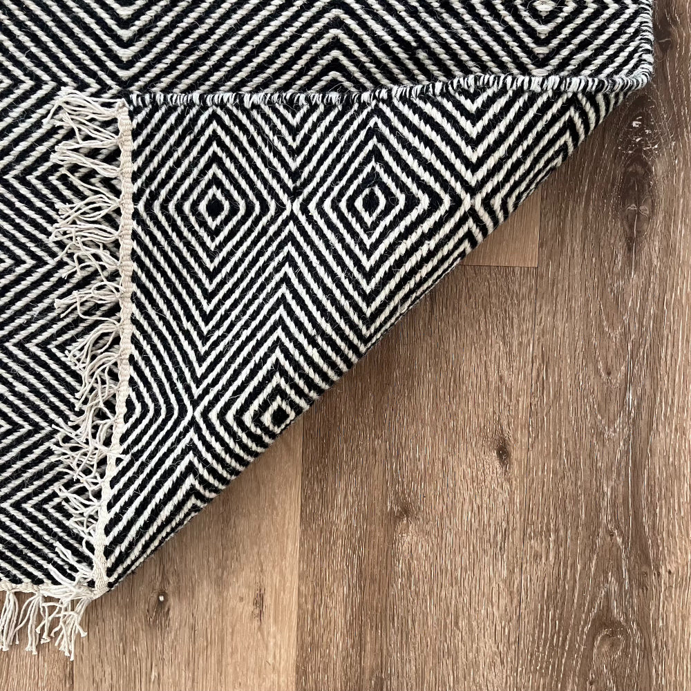 Rolf Black and White Geometric Diamond Wool Rug - Fringed, 120 x 180cm