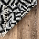 Rolf Black and White Geometric Diamond Wool Rug - Fringed, 120 x 180cm