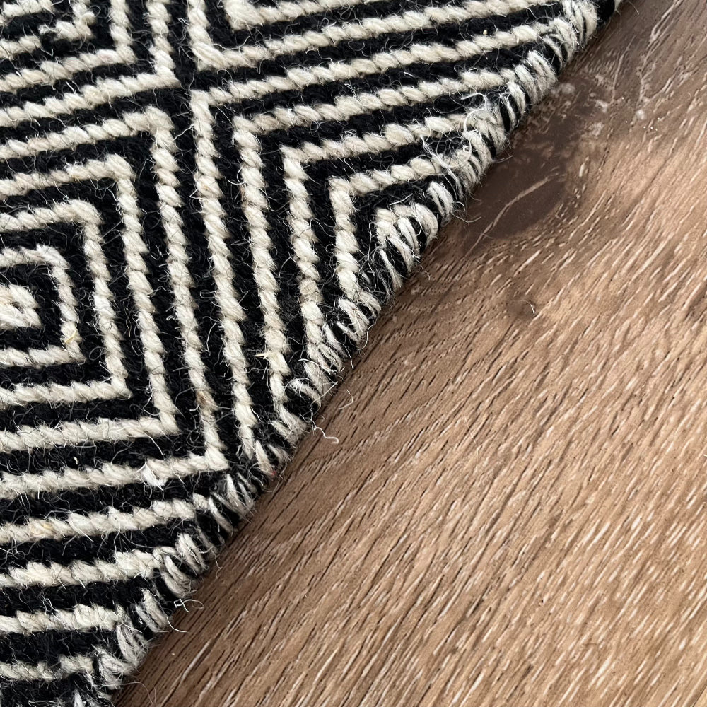 Rolf Black and White Geometric Diamond Wool Rug - Fringed, 120 x 180cm