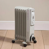Daewoo Mini Oil Filled Radiator | 7 Fin White Heater | 1500W - Choice Stores